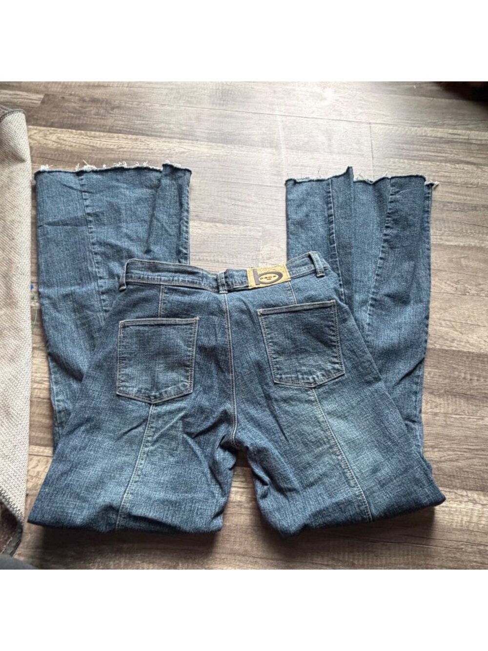 Vintage Bebe Womens Flared Denim Jeans Size 28 High Waist Pleated Panels Raw Hem